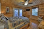 Upstairs bedroom with a queen bed, flat screen TV Streaming Only